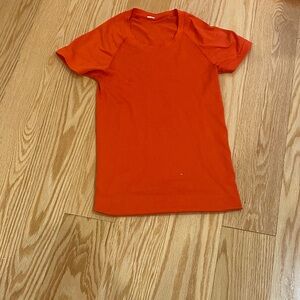 lululemon athletica swiftly tech. Orange Red color. SIZE 0